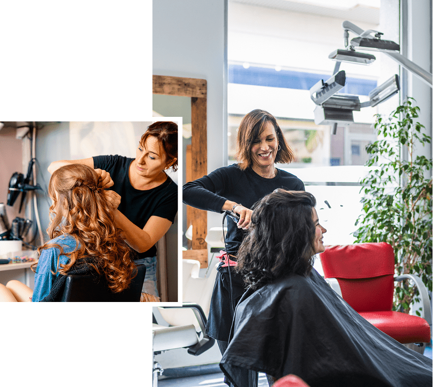 Hairdressers styling clients' hair in salon.