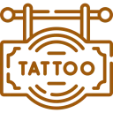 Tattoo parlor sign with decorative design.